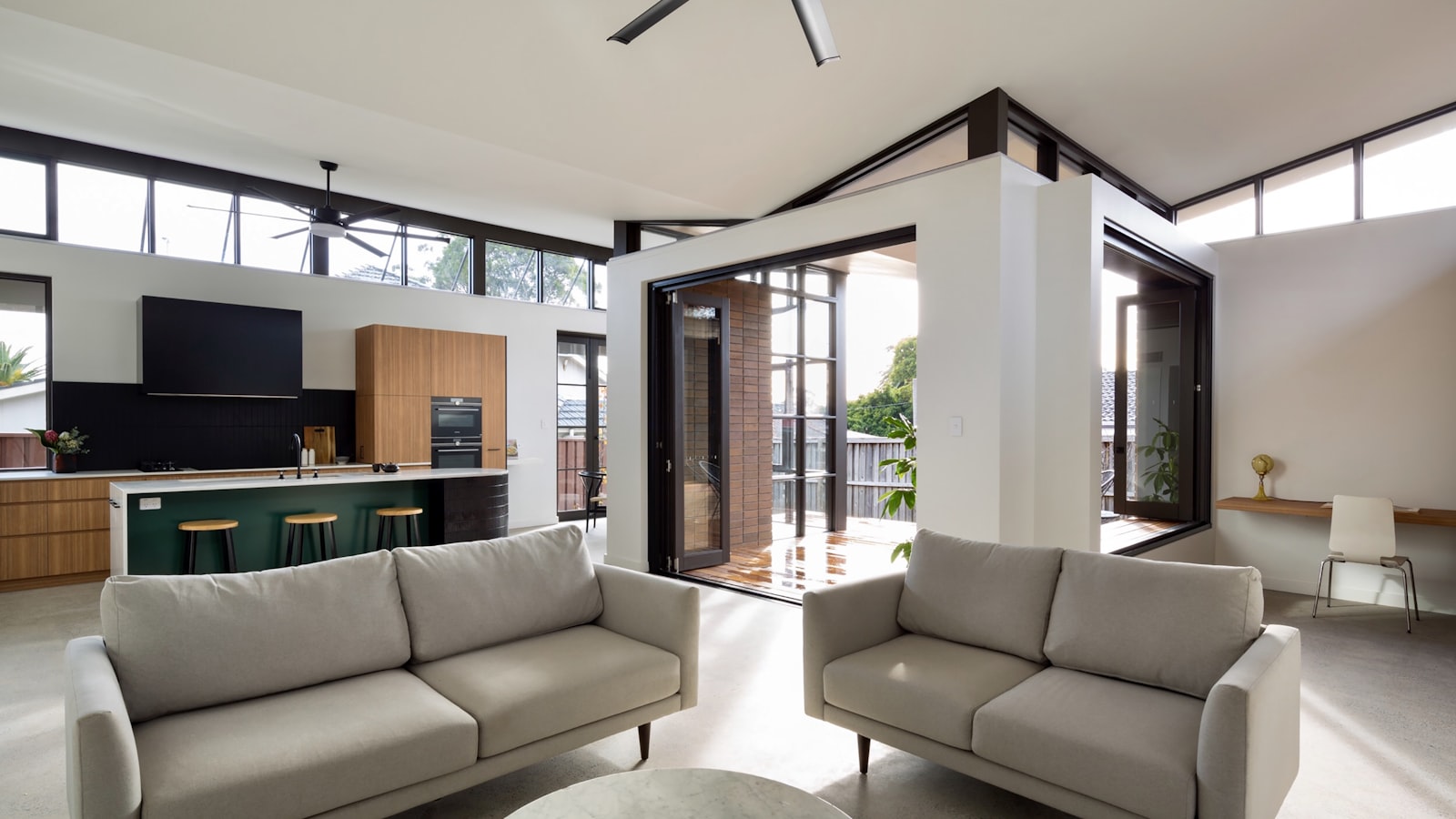 A modern open-plan living room and kitchen
